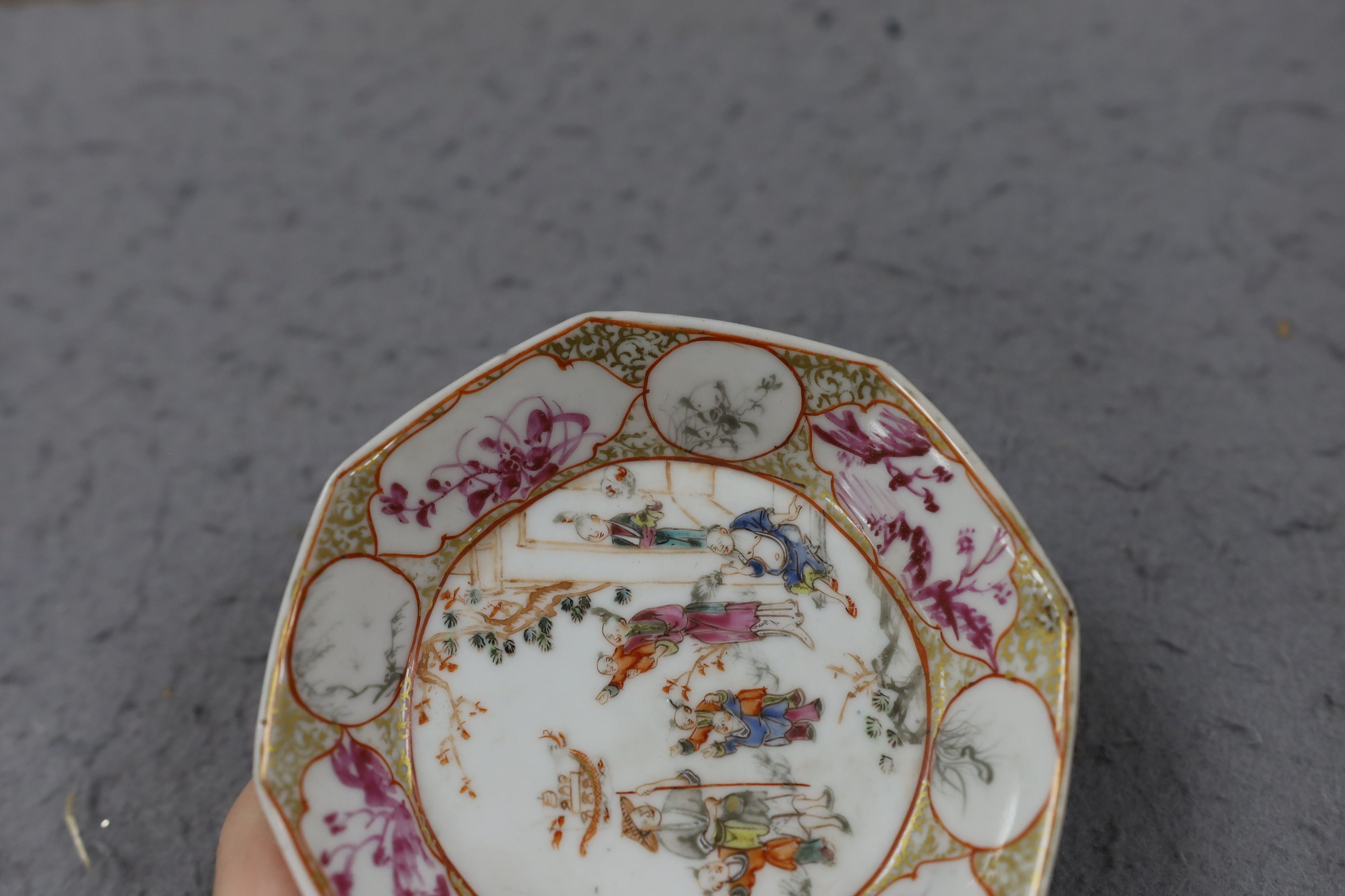 A group of four 18th century Chinese export famille rose saucers